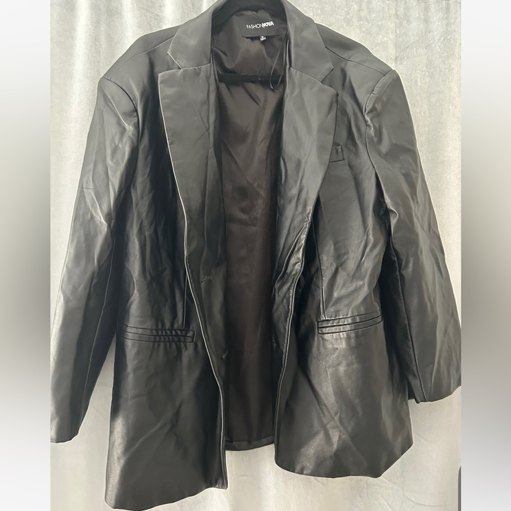 Oversized black leather jacket